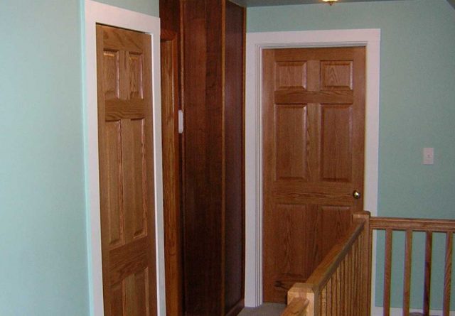 Covenant Construction Group - Interior Remodel, Wood Banisters and Doors - Ann Arbor, MI
